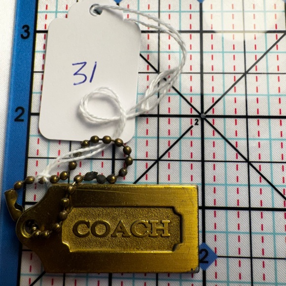 Coach Gold Tag - Picture 2 of 2